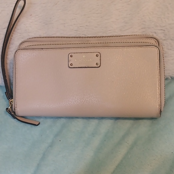 kate spade Handbags - Kate Spade cream color wristlet